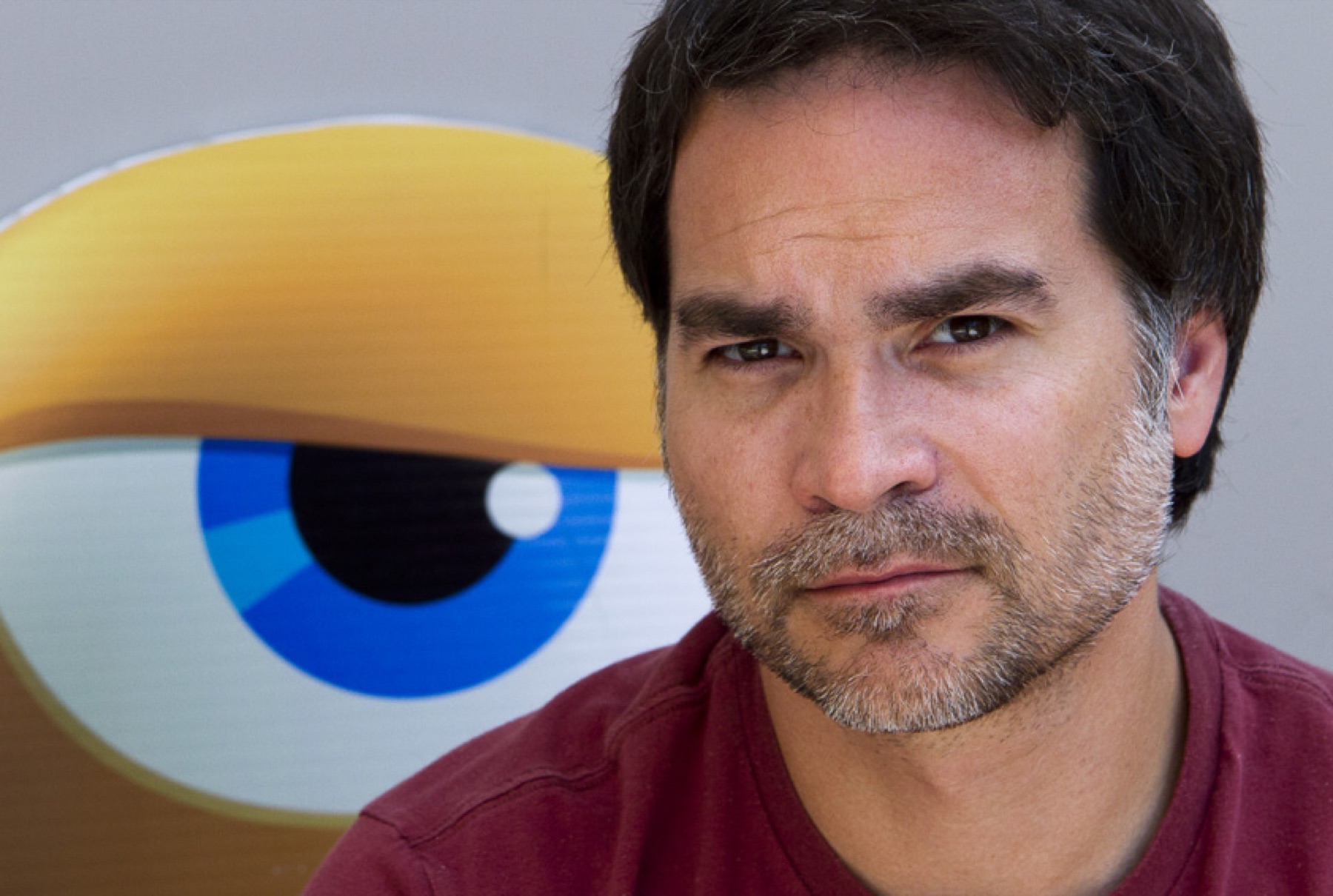 Steve Talkowski in front of a giant Sketchbot eye